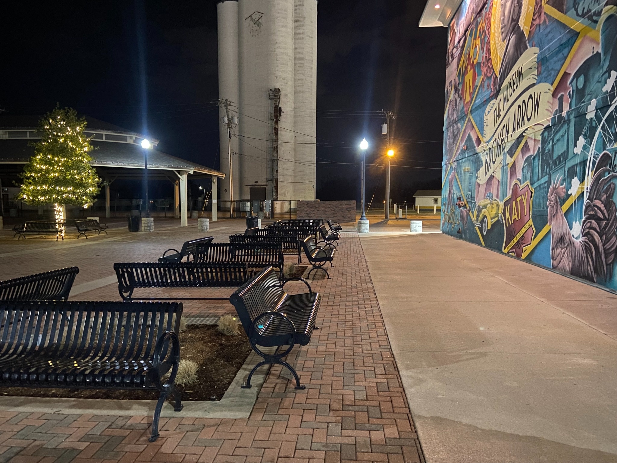 Commercial plaza and mural cleaned at night